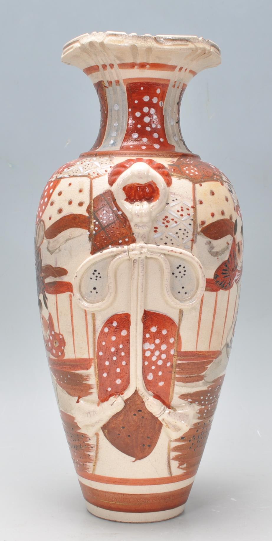 A late 19th / early 20th Century Japanese vase hand decorated in red and white with male figures - Image 2 of 7