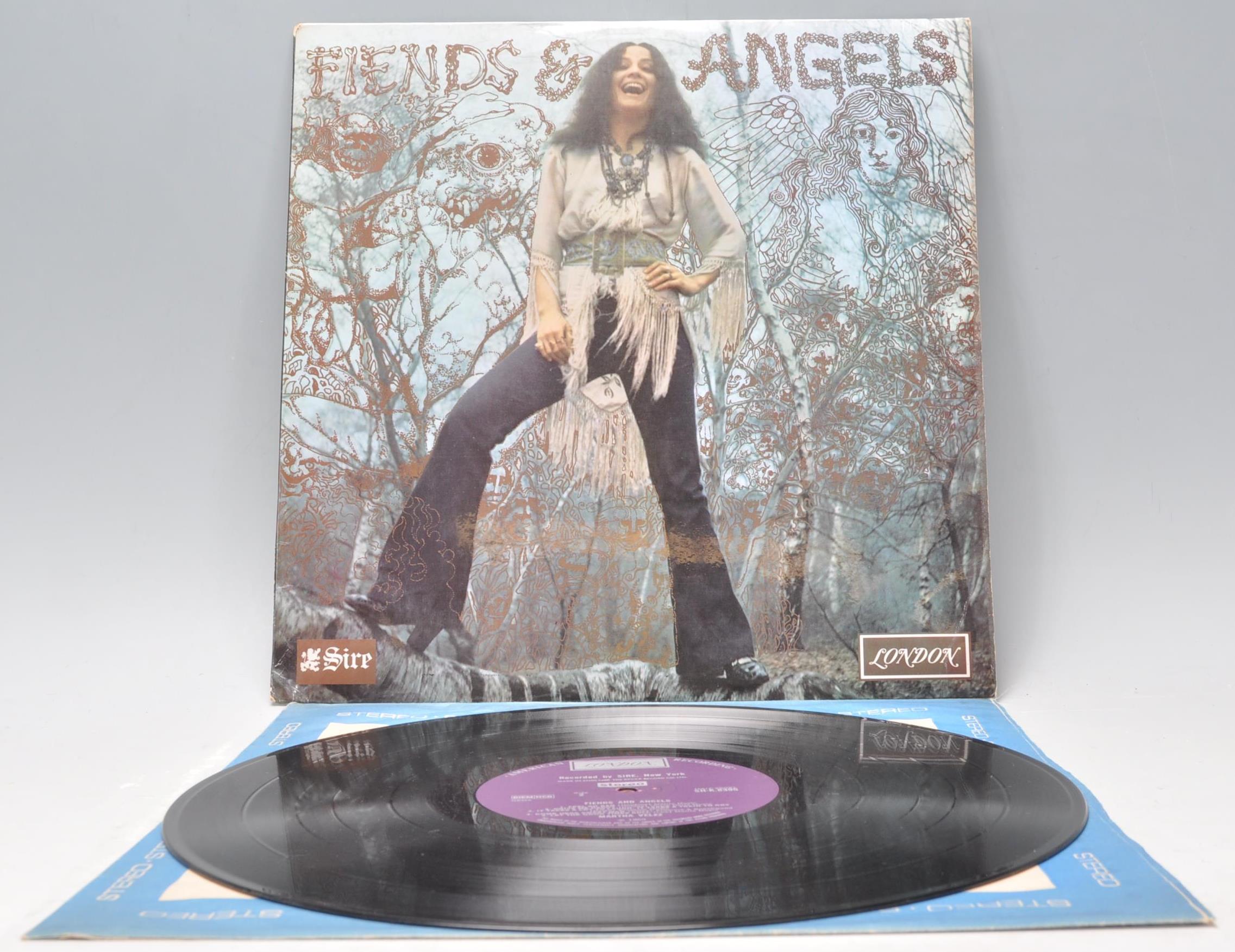 A vinyl long play LP record album by Martha Velez – Fiends & Angels – Original Sire London 1st U.S.A