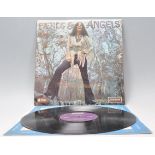 A vinyl long play LP record album by Martha Velez – Fiends & Angels – Original Sire London 1st U.S.A