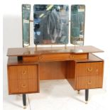 A retro mid 20th Century 1960's G Plan Librenza pattern dressing table raised on ebonised tapering