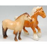 A  collection of 2 Beswick horse porcelain figurines to include a cantering palomino coloured