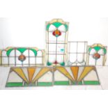 A good group of early 20th Art Nouveau stained led lined glass windows having. Together with two Art