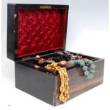 An early 20th Century coromandel wood jewellery box with a brass handle lid filled with a lovely
