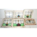 A good group of seven early 20th century vintage led lined stained glass windows set within window