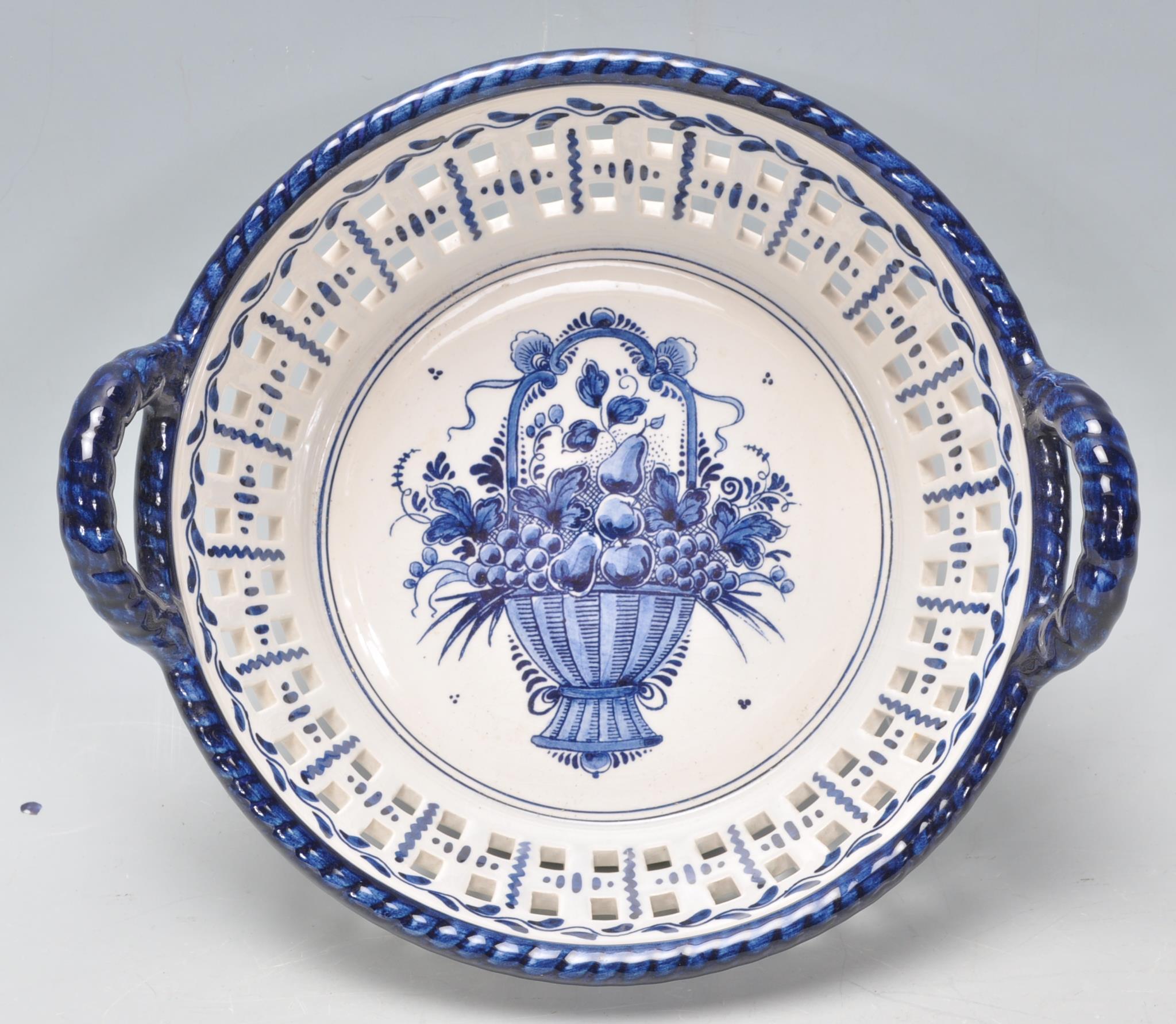 A collection of 20th Century Delft and Faience ware items to include a blue and white guglet vase - Image 14 of 18