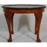 A mid century Queen Anne revival walnut coffee / occasional table having a walnut veneered top