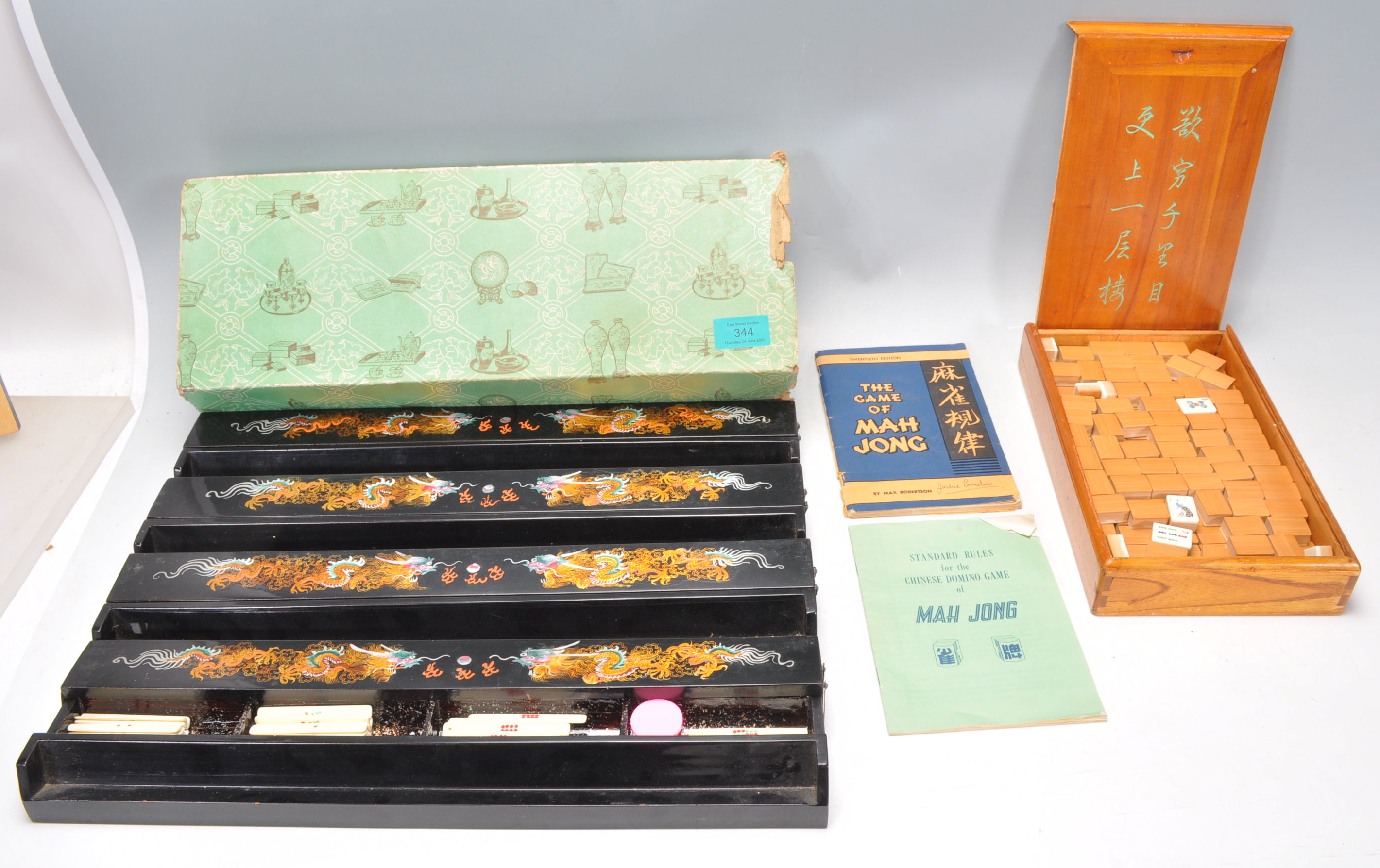 A Chinese 20th century Mah Jong games set  complete with the original wooden case and the other