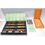 A Chinese 20th century Mah Jong games set  complete with the original wooden case and the other