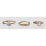 2 9ct gold hallmarked gem set rings together with another unmarked 9ct gold gem set ring. To include