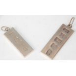 Two vintage silver hallmarked ingot pendants of simple rectangular form. Each ingot hallmarked for