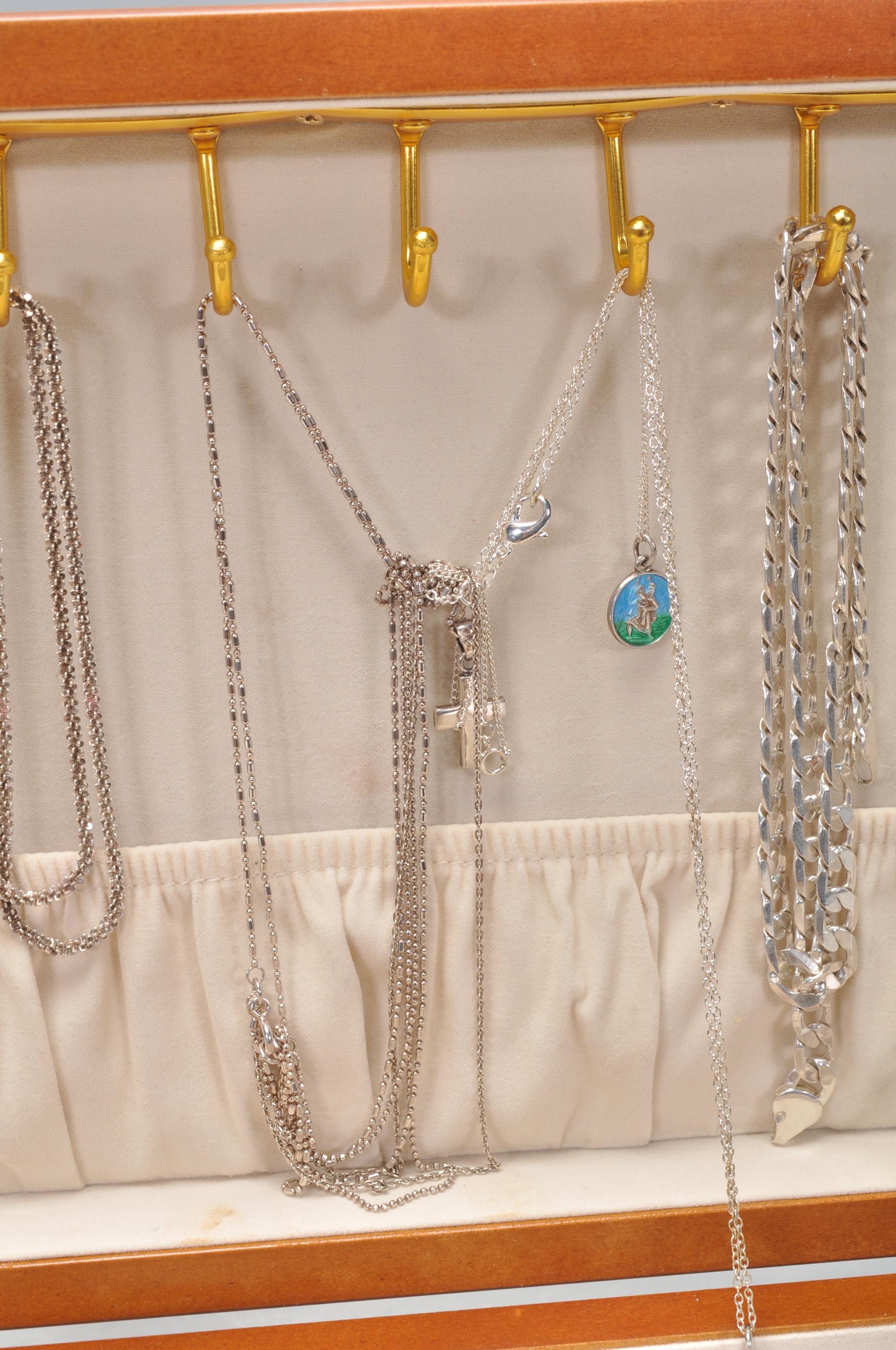 A mixed group of mostly silver jewellery to include silver heart locket pendants, cross and St. - Image 4 of 11