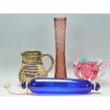 A collection of vintage ceramics to include a Bristol blue glass rolling pin, a Czech pink glass