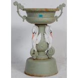 A 20th Century cast iron garden furniture cast iron bird bath having a round plinth base with