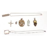 A mixed group of silver ladies pendants to include silver hallmarked ingot on a snake chain, a