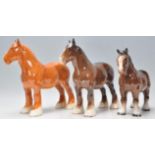 A collection of 3 20th century Beswick shire horse porcelain figurines to include a dary bay with