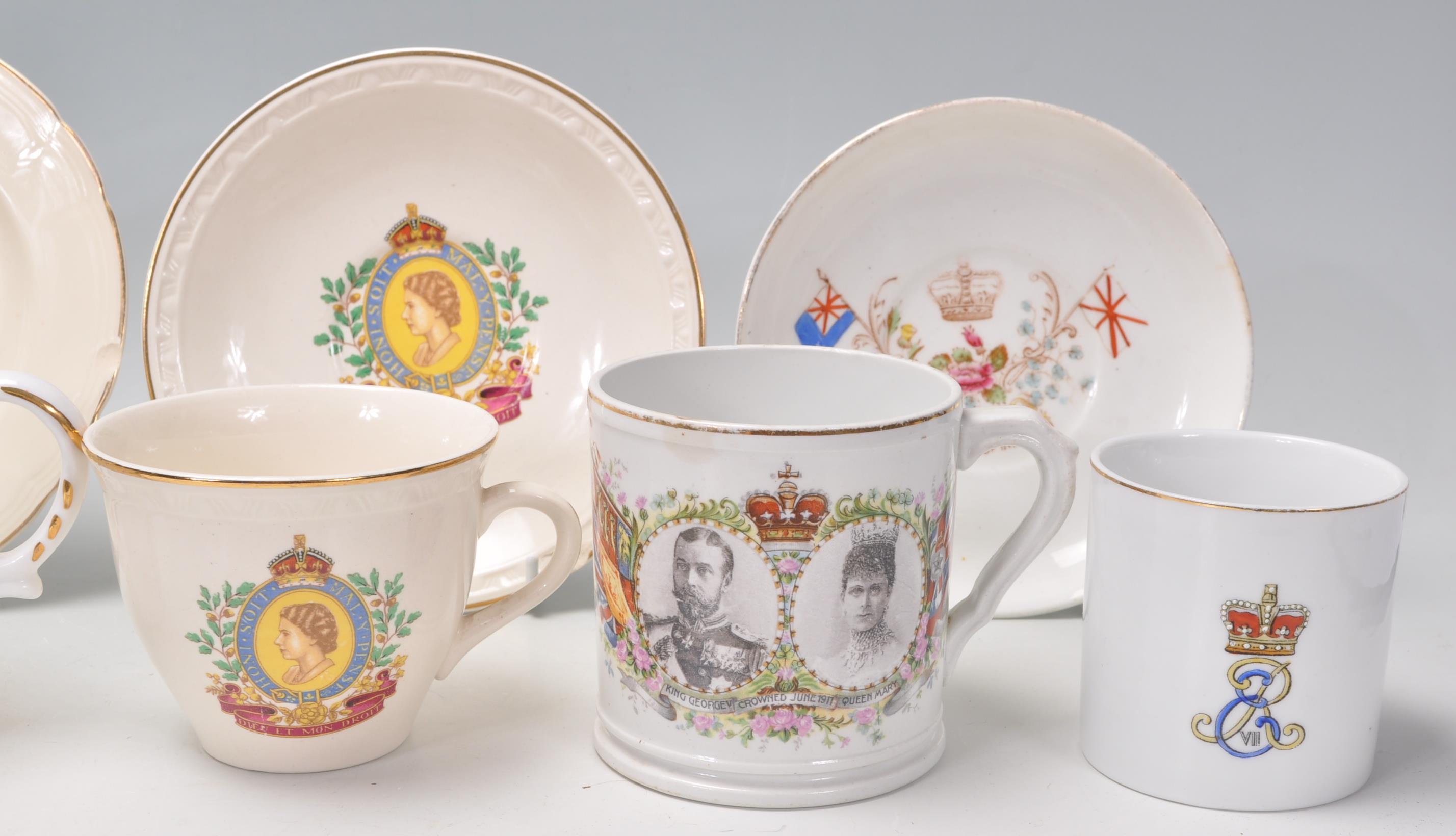 A collection of commemorative Royal memorabilia mugs to include a Queen Victoria mug, a First - Image 4 of 12