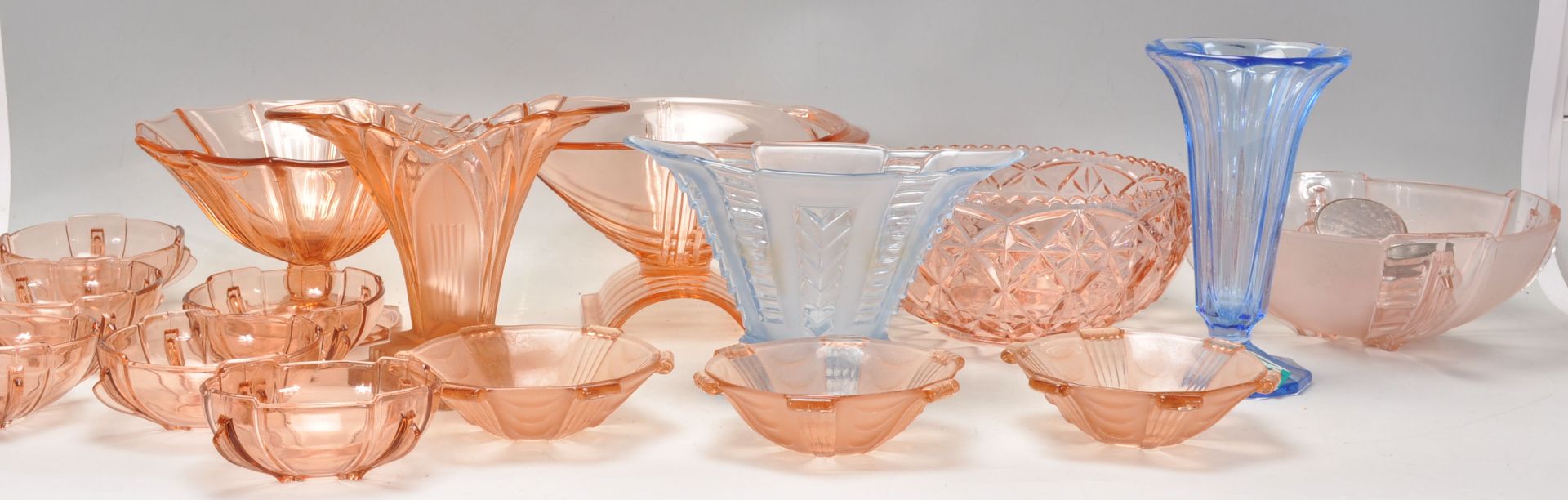 A group of early 20th Century Art Deco 1930's blue and pink glassware to include decorative vases