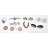A small group of silver jewellery to include a RAF enamelled brooch, silver ring with a blue stone