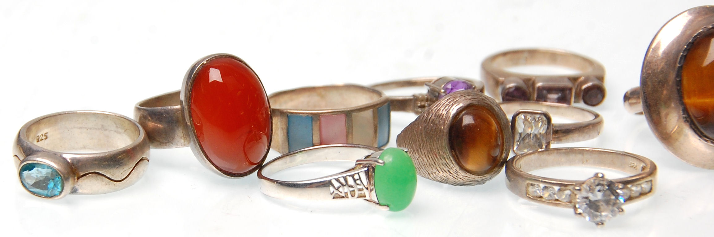 A collection of fifteen vintage silver rings to include two rings set with tigers eye, a redstone - Image 2 of 4