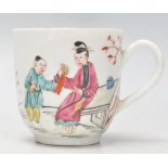 A 19th Century Chinese export porcelain tea cup having hand painted polychrome decoration