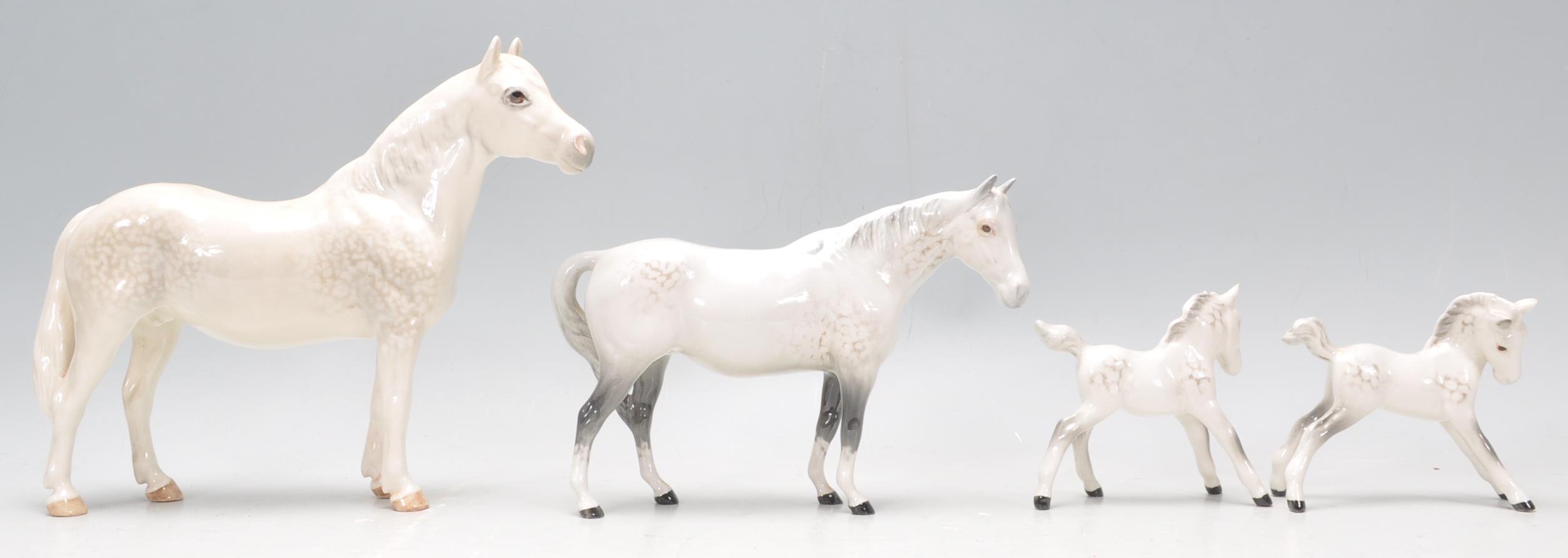 A  collection of 2 Beswick horse porcelain figurines to include 2 dapple grey coloured mares, all - Image 3 of 8