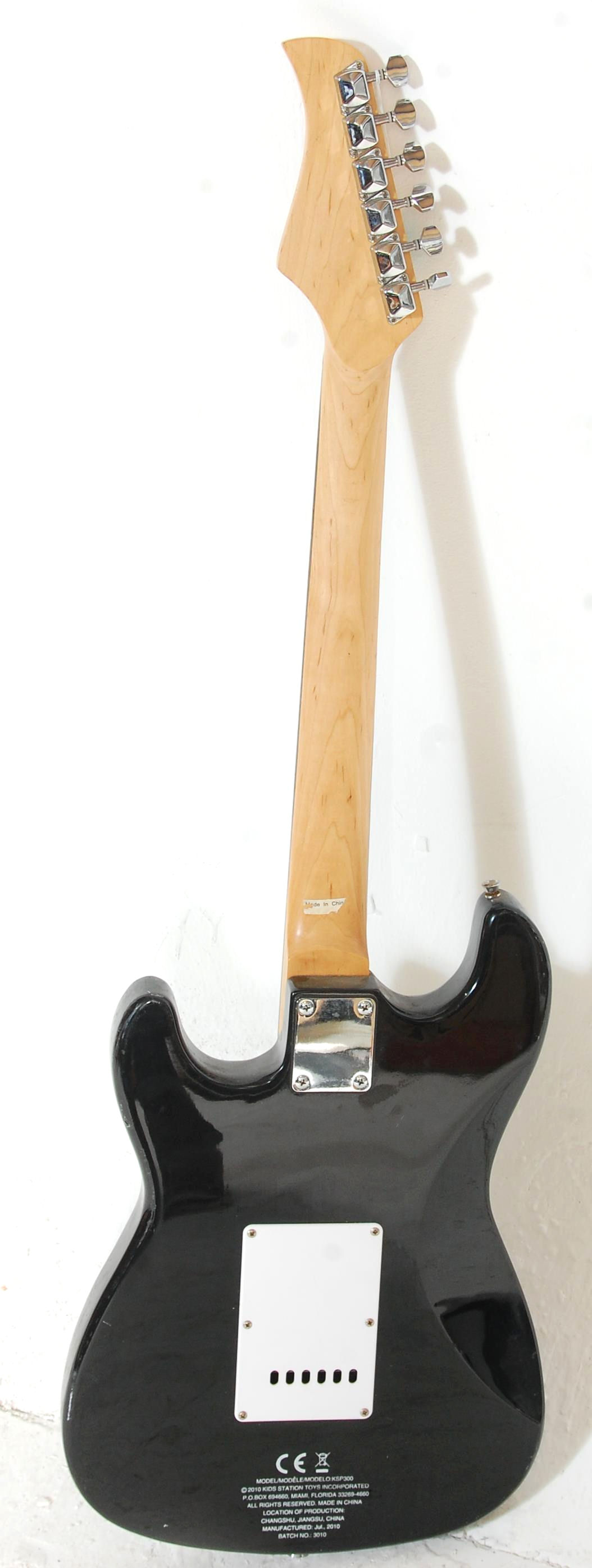 A six string electric guitar by Power Play having a black body with a white scratch guard, fretboard - Image 6 of 7