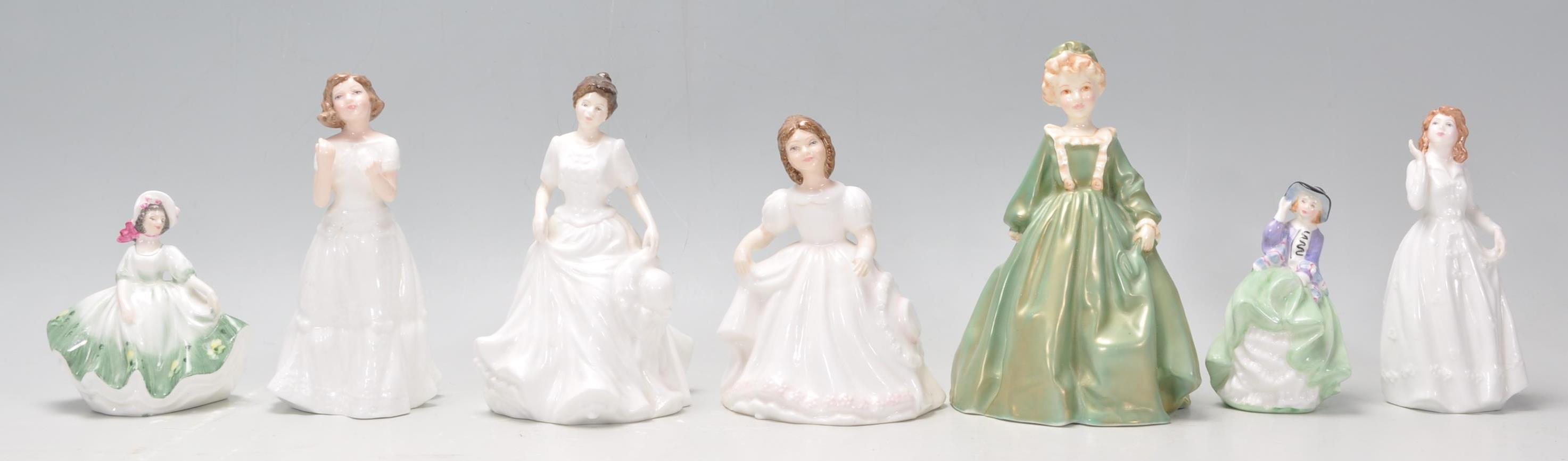 A collection of Royal Doulton figurines to include Harmony HN4096, Amanda HN3635, Royal Doulton