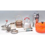 A  collection of vintage 20th century  kitchenalia to include a Le Creuset Belgian orange