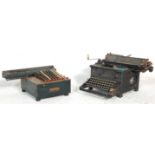 A vintage retro 1930's Imperial typewriter together with an adding machine of similar age, both
