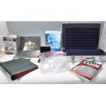 A good selection of various coin collectors equipment to include coin folders and books, a great