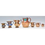 A collection of 19th century jugs to include a Stoneware harvest jug with silver collar, a