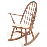 A 20th century Ercol Goldsmith pattern / model 369 beech and elm wood Windsor rocking chairs /