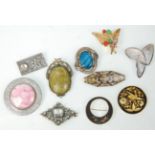 A mixed group of ten ladies vintage brooches to include two Miracle examples set with stone
