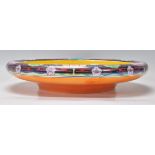 A 1930's Art Deco lustre polychrome bowl with fairyland style decorated borders, orange and yellow