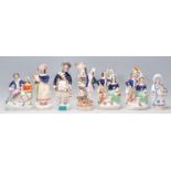 A group of 19th Century Victorian Staffordshire figurines to include a musician, a Scottish figure