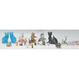 A collection of vintage and antique cats to include white metal pill boxes, a pair of Chinese