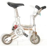 A good stunt / circus Mission Micro Bike bicycle having a leather seat and cushioned grips.
