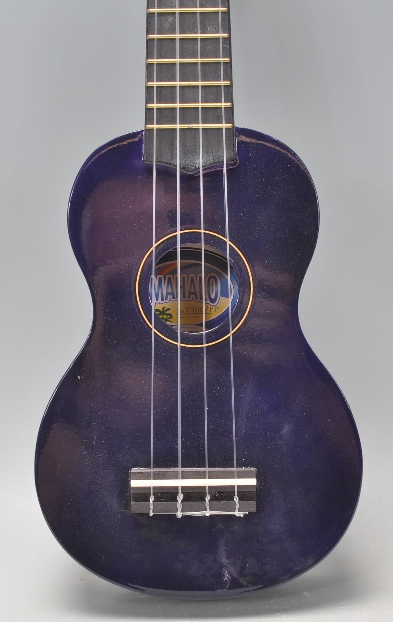 A good Mahalo made four string ukulele finished in blue. 52cm long. - Image 4 of 9