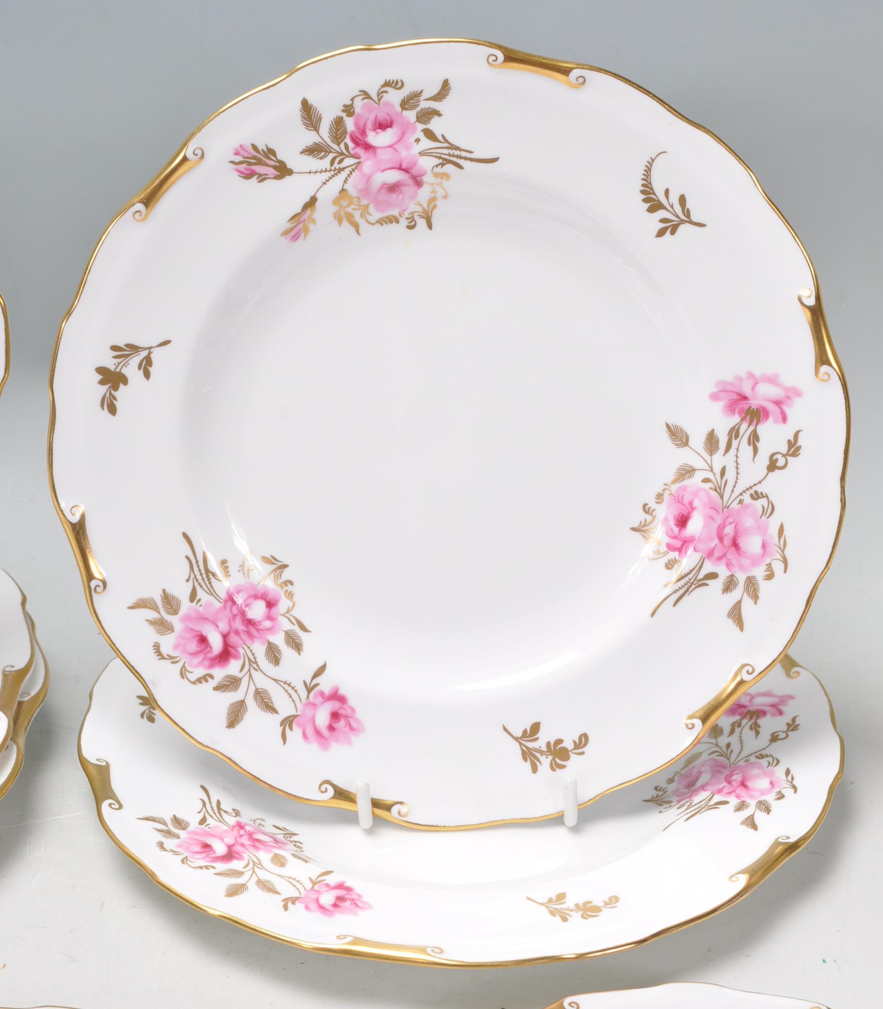 A group of Fine Bone English China plates by Royal Crown Derby in Pinxton Roses pattern with hand - Image 4 of 9