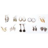 A selection of silver earrings to include a pair of gilt crocodile drop earrings, a pair of silver