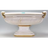 A good large ceramic urn planter of oval form having gilt banding with gilt ribbon decoration to the