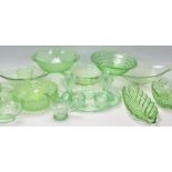 A group of early 20th Century Art Deco 1930's green uranium glassware to include a decorative