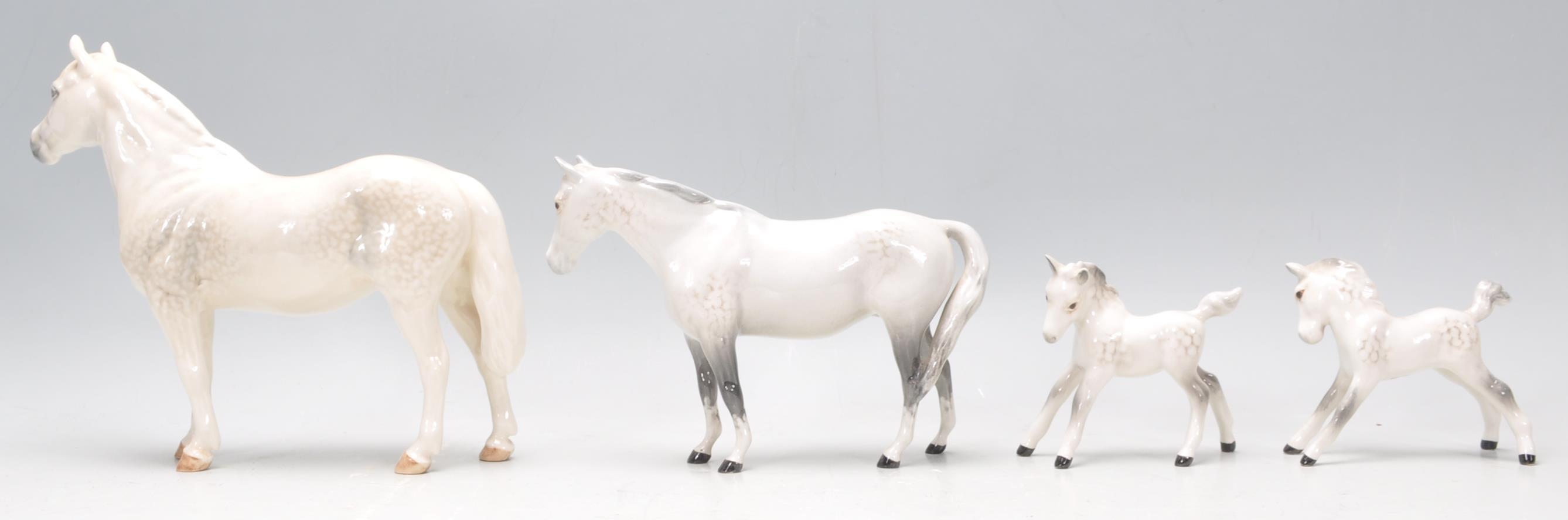 A  collection of 2 Beswick horse porcelain figurines to include 2 dapple grey coloured mares, all - Image 6 of 8