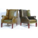A pair of antique revival 20th century green leather Chesterfield fireside wing back armchairs