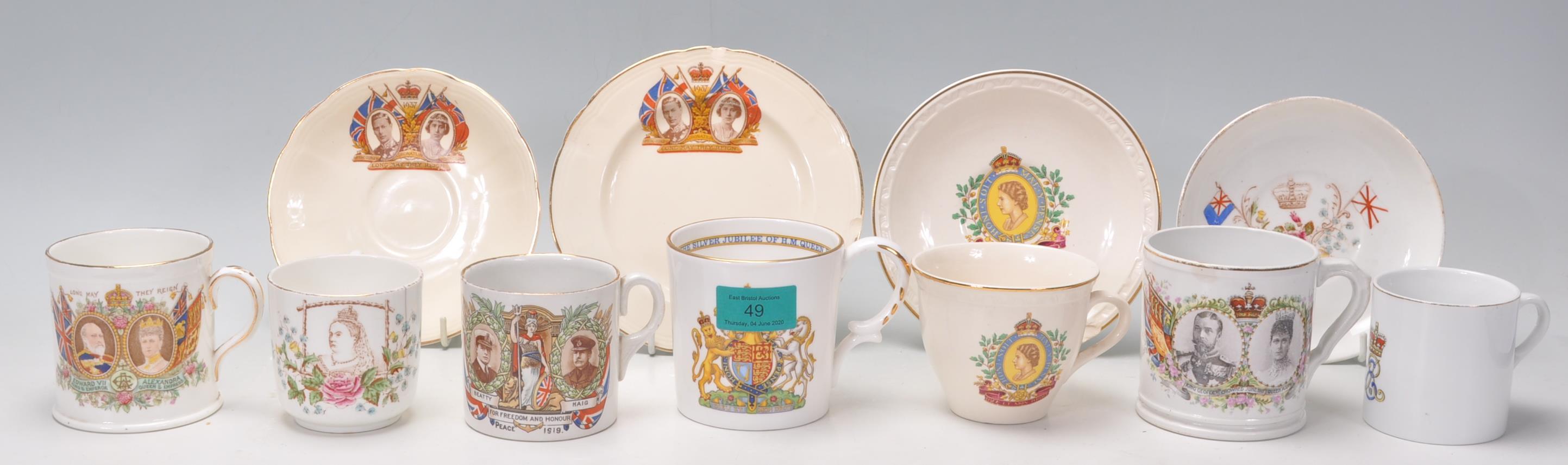 A collection of commemorative Royal memorabilia mugs to include a Queen Victoria mug, a First