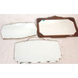 A group of three vintage wall mirrors to include a 1920's art deco oak framed wall mirror with