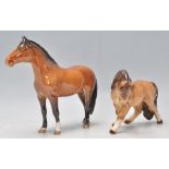 A collection of 2 Beswick horse porcelain figurines to include a chestnut bay coloured mare