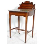 A late Victorian 19th Century mahogany ladies writing desk with satinwood crossbanded inlay. The