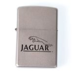 An original 20th century unused Jaguar Zippo USA lighter in Stainless steel with Jaguar emblem etc.