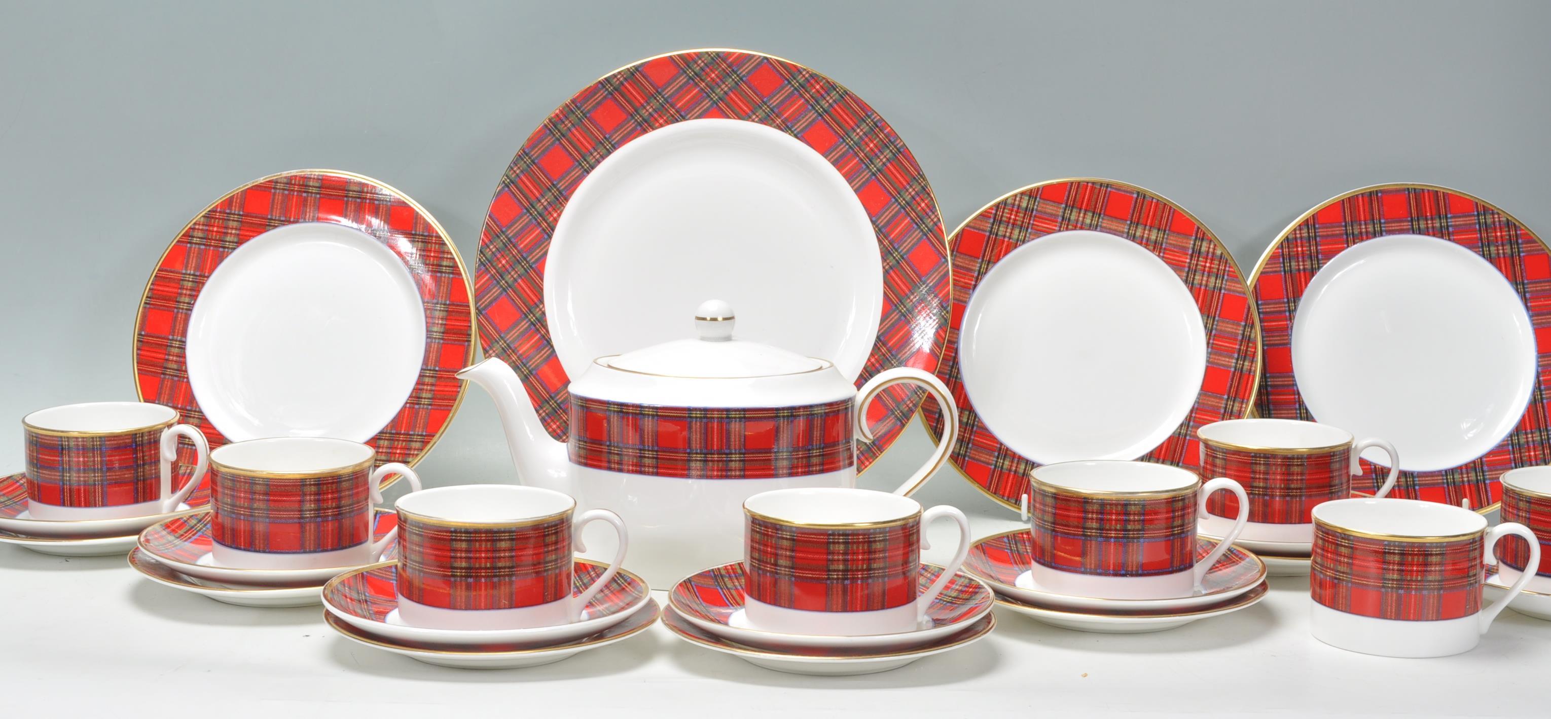 A good Royal Crown Duchy Tartan pattern tea service comprising six cups, saucers and side plates (